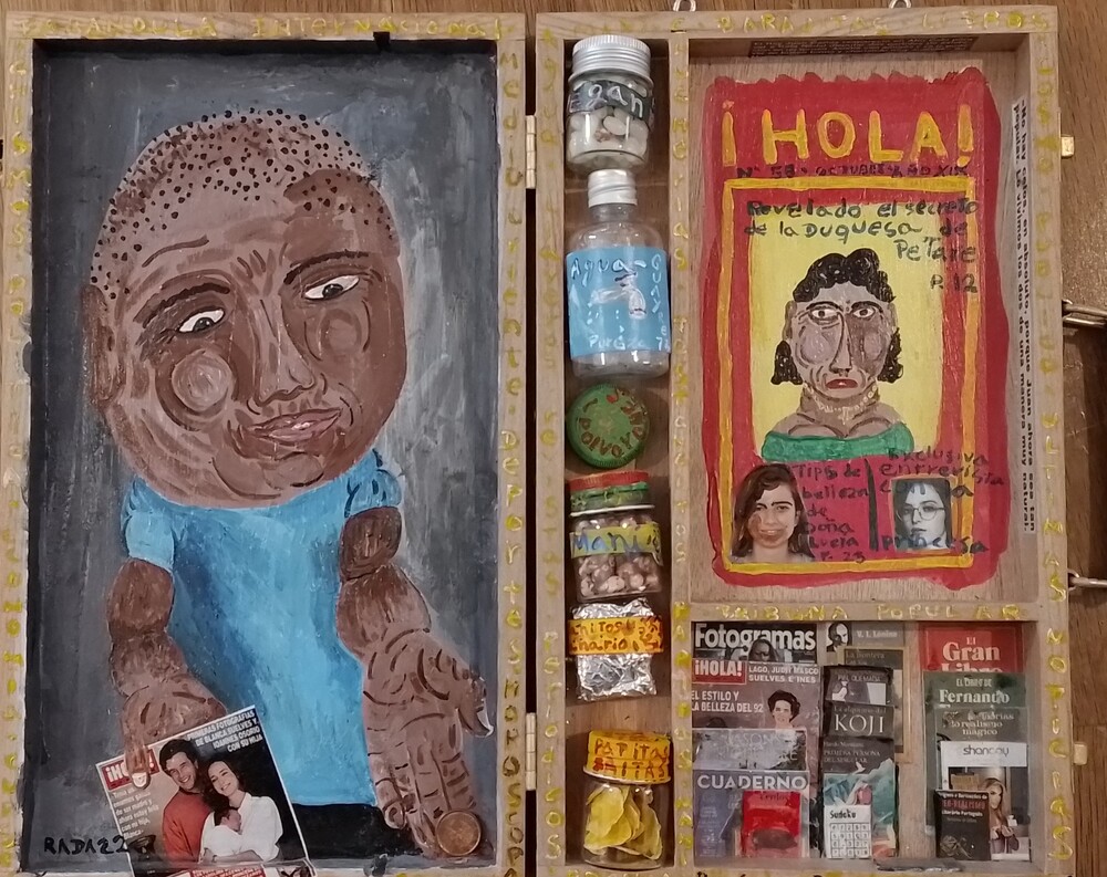 <b>Kioskero</b><br>Técnica: Técnica mixta, acrilico, objetos varios, en una caja de madera<br>Dimensiones: 36x30cm<br>Año: 2022